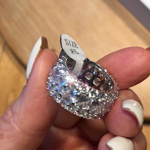 Triple row eternity white sapphire band.